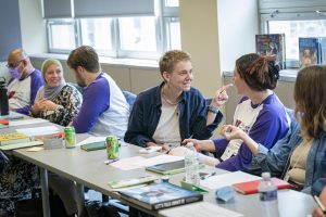 People discussing in small groups