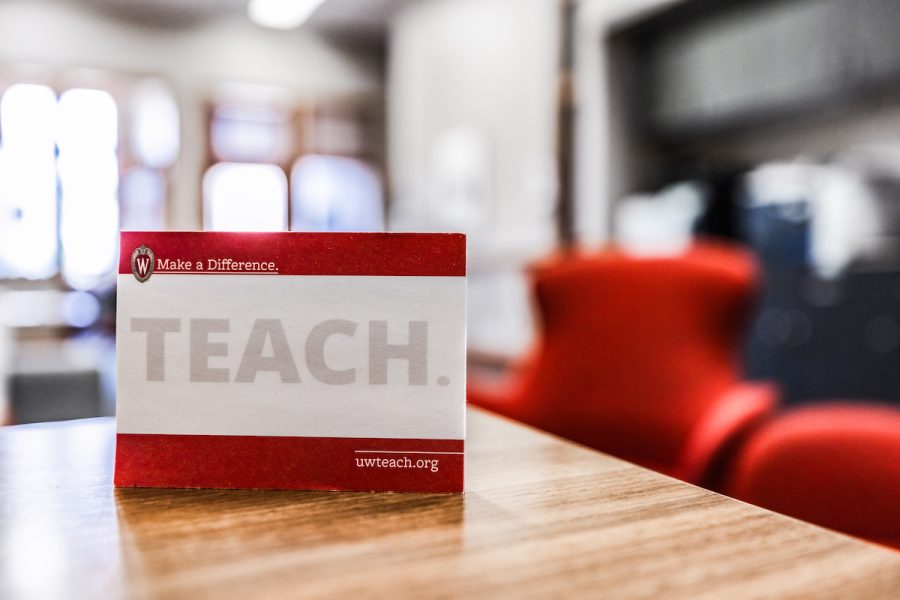 a sign that says teach